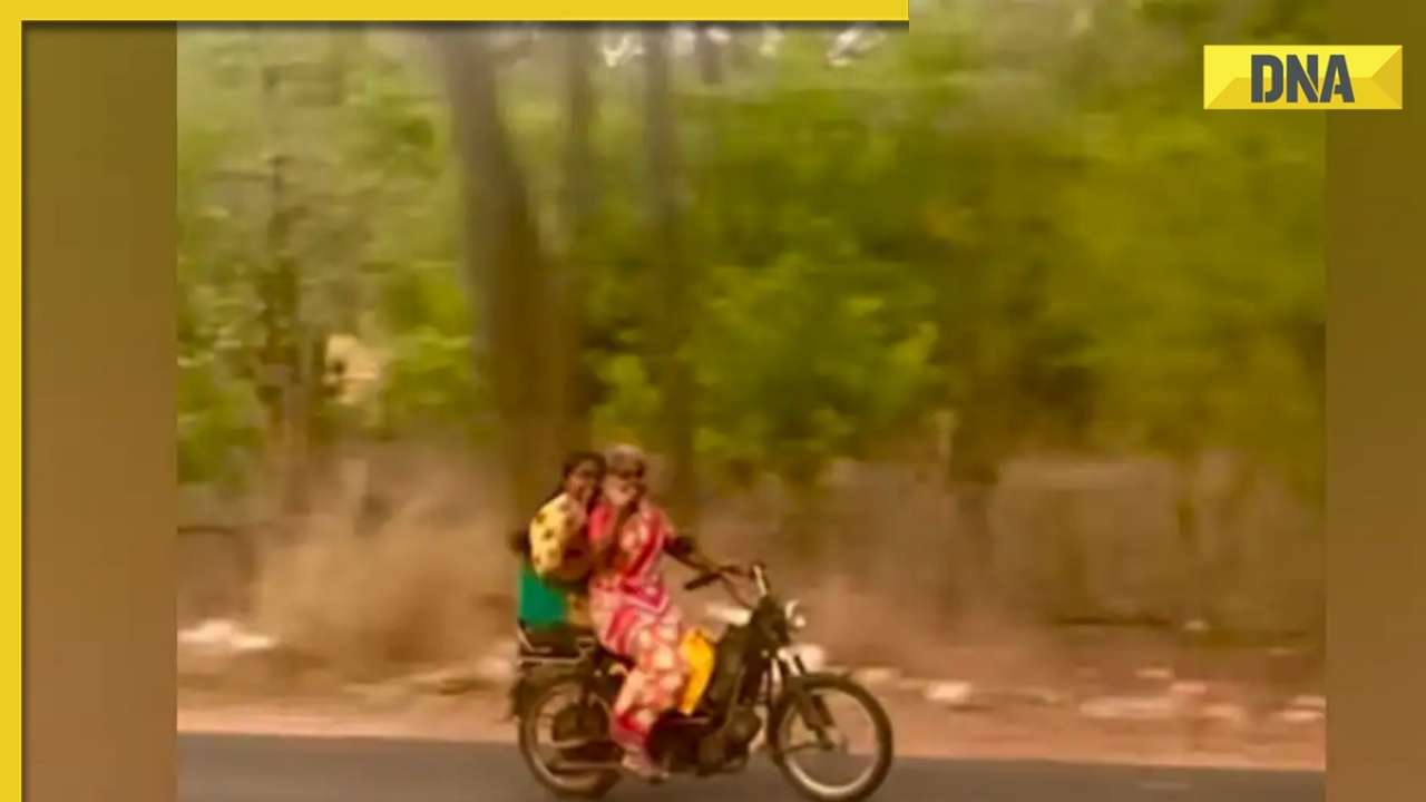 在这段走红的视频中，一名身穿纱丽的女子一边骑自行车一边飞吻，网友们反应热烈